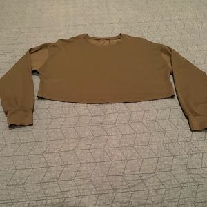 Lulu lemon muscle love long sleeve crop top in olive green. Size 4.